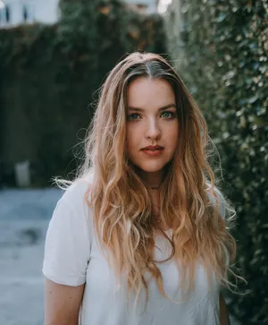 Blonde Womanin White Tee Wallpaper