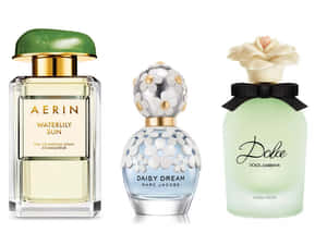 Blooming Spring Flowers With A Perfume Bottle Wallpaper