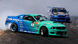 Blue And Green Drift Cars Wallpaper