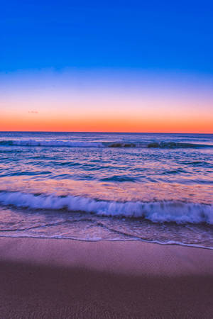 Blue And Orange Sunset Beach Android Wallpaper