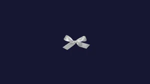 Blue Bow On Dark Background Wallpaper