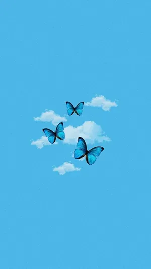 Blue Butterflies Flying In The Sky Wallpaper