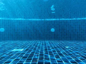 Blue Checkered Pool Flooring Wallpaper