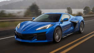 Blue Corvette C8 On The Road Wallpaper