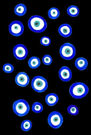 Blue Evil Eye Amuletson Black Wallpaper