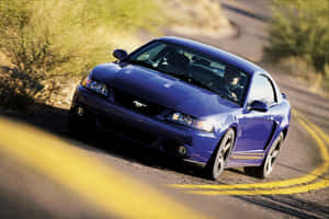 Blue Ford Mustang S V T Cobra Speeding Wallpaper