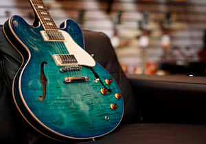 Blue-green Gibson 335 Wallpaper