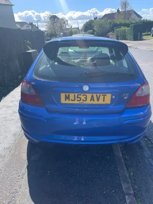 Blue Hatchback Rear View Wallpaper