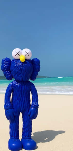 Blue Kaws Figureon Beach Wallpaper