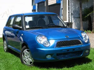 Blue Lifan320 Compact Car Wallpaper