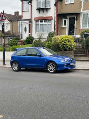 Blue M G Z R Parked Residential Street Wallpaper