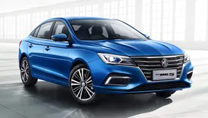 Blue M G5 Sedan Showroom Wallpaper