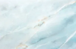 Blue Marble Laptop On A Wooden Surface Wallpaper