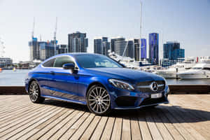 Blue Mercedes Benz C Class Coupe Marina Backdrop Wallpaper