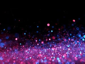 Blue Ocean Waves Breaking Onto A Stony Beach Wallpaper