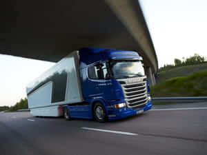 Blue Scania Truck On Highway.jpg Wallpaper