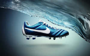 Blue Soccer Cleat Water Splash Wallpaper