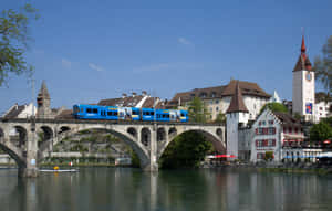 Blue_ Train_ Crossing_ Stone_ Bridge Wallpaper