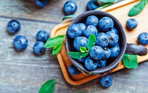 Blueberries Mug On A Table Wallpaper