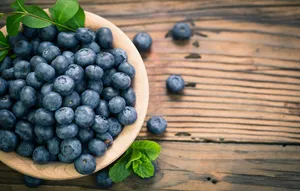 Blueberries On Wooden Bowl Wallpaper