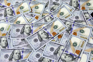 Bluish 100 Dollar Bill Pile Wallpaper
