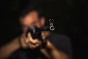 Blurred Faces Of Gangsters With Guns Wallpaper