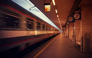 Blurred Train Passing Platform Number Three.jpg Wallpaper