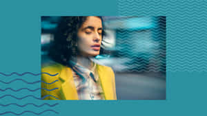 Blurry Image Of A Giddy Woman Wallpaper