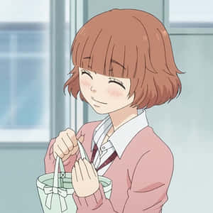 Blushing Anime Girlwith Gift Bag Wallpaper