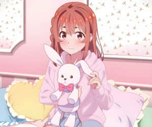 Blushing Sumi With A Bunny Toy Wallpaper