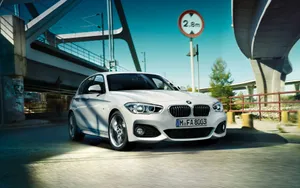 Bmw 1 Series Impressively Cruising On The Open Road. Wallpaper