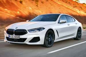 Bmw 8 Series Luxury Coupe On The Road Wallpaper