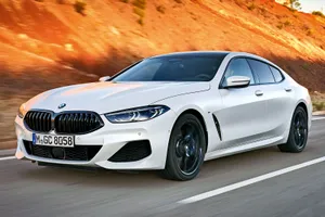 Bmw 8 Series Luxury Coupe On The Road Wallpaper