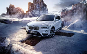 Bmw X1: Luxury Compact Suv In Action Wallpaper