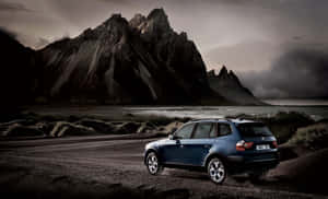 Bmw X3 Luxury Suv In Motion Wallpaper