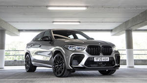 Bmw X6 M In A Parking Lot Wallpaper