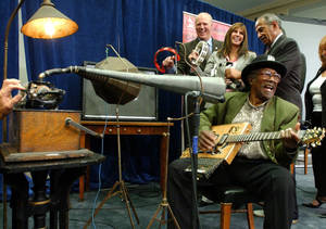 Bo Diddley Singing In A Studio Wallpaper