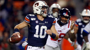 Bo Nix Auburn Quarterback Action Wallpaper