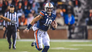 Bo Nix Auburn Quarterback Action Shot Wallpaper