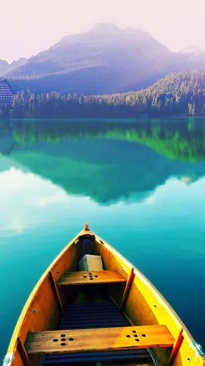 Boat On Still Lake Wallpaper