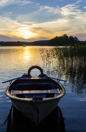 Boating Adventure On A Sunny Day Wallpaper