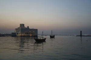 Boats At Dusk Near Museum Of Islamic Art Wallpaper