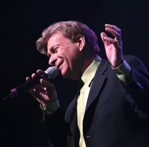 Bobby Caldwell Performing Live On Stage Wallpaper