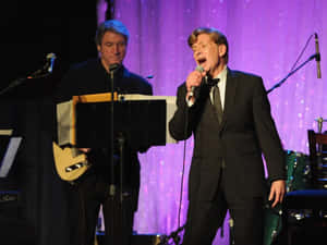 Bobby Caldwell Performing Live On Stage Wallpaper
