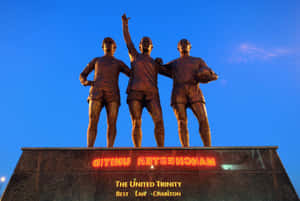 Bobby Charlton United Trinity Statue Photography Wallpaper