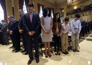 Bobby Jindal Praying With Family Wallpaper