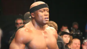 Bobby Lashley In Action With A Black Sports Headband Wallpaper
