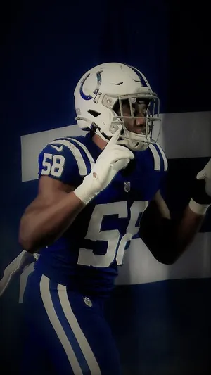 Bobby Okereke In Action On The Field Wallpaper