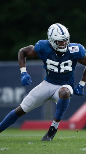 Bobby Okereke In Action On The Field Wallpaper