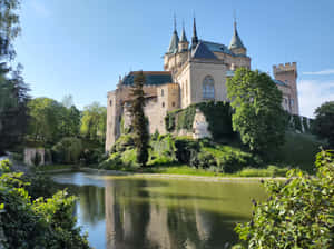 Bojnice Castle Standing Atop The Grass Wallpaper